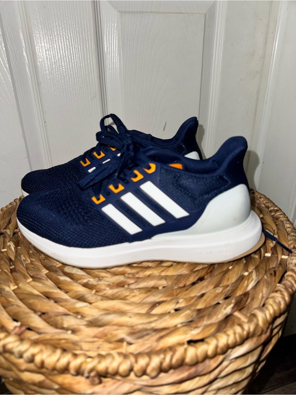 adidas Kids Navy Blue Sneakers with White Stripes and Orange Accents size 5.5
